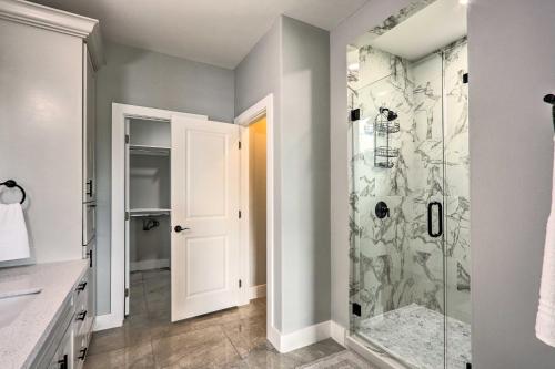 a bathroom with a shower with a glass door at Stunning Laguna Vista Retreat with Pool and Grill in Laguna Vista