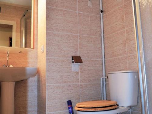 a bathroom with a toilet and a sink at Studio Cabine Sud avec Parking, à 300m du centre de Font-Romeu - FR-1-580-31 in Font Romeu Odeillo Via