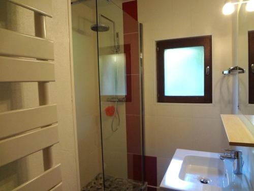 a bathroom with a sink and a glass shower at Chalet Arêches-Beaufort, 4 pièces, 10 personnes - FR-1-342-224 in Beaufort