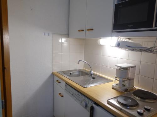 Photo de la galerie de l'établissement Appartement 4 pers avec balcon plein sud, proche pistes et piscine, Beaufort сурация - FR-1-342-258, à Beaufort