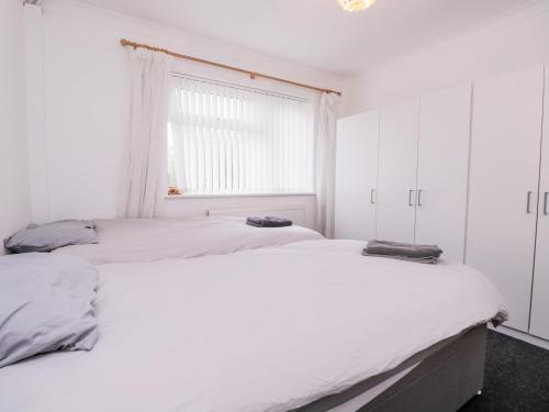 Postel nebo postele na pokoji v ubytování 1 Springfield Road