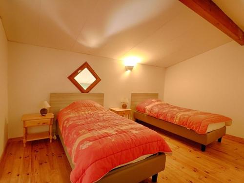 Postel nebo postele na pokoji v ubytování Appartement Calcatoggio, 3 pièces, 6 personnes - FR-1-61-548