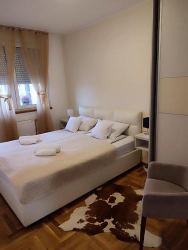 Llit o llits en una habitació de Apartment Rosa