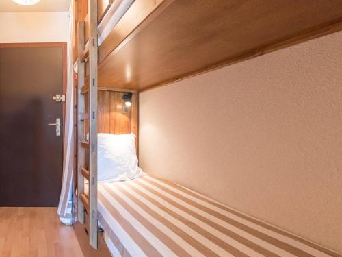 Postelja oz. postelje v sobi nastanitve Appartement Montgenèvre, 1 pièce, 4 personnes - FR-1-330D-77