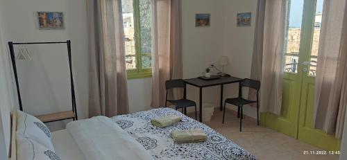 Ένα ή περισσότερα κρεβάτια σε δωμάτιο στο Apartments COMFY - for a quiet family holiday