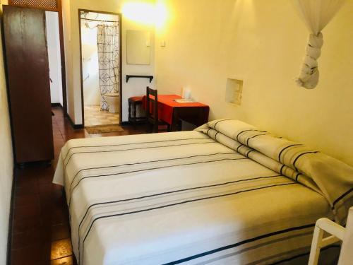 Postel nebo postele na pokoji v ubytování Hotel Hemadan