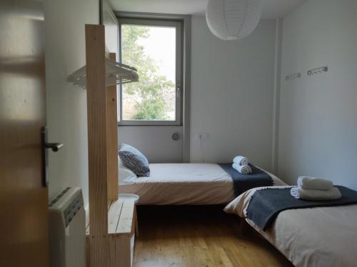 Postel nebo postele na pokoji v ubytování A casa da Pena Vixia