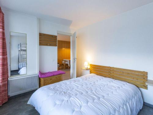 Giường trong phòng chung tại Appartement La Mongie, 2 pièces, 6 personnes - FR-1-404-335