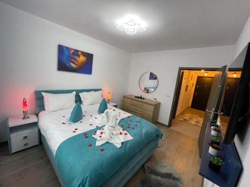 Un pat sau paturi într-o cameră la Apartamente Lux SYA Residence