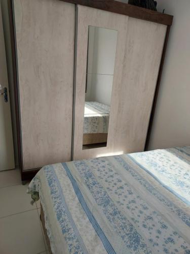Ein Bett oder Betten in einem Zimmer der Unterkunft Apartamento para temporada
