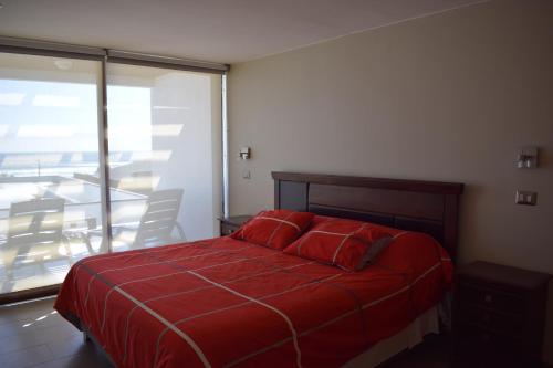 Ein Bett oder Betten in einem Zimmer der Unterkunft Terrazas de Maitencillo