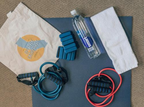 a pair of cables and a bottle of water on a table at PlumpJack Inn in Olympic Valley