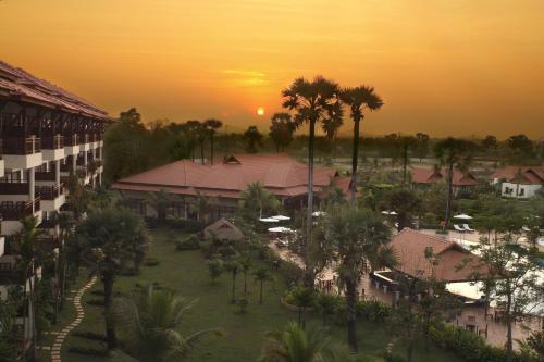 an aerial view of a resort with palm trees at Angkor Palace Resort & Spa in Siem Reap