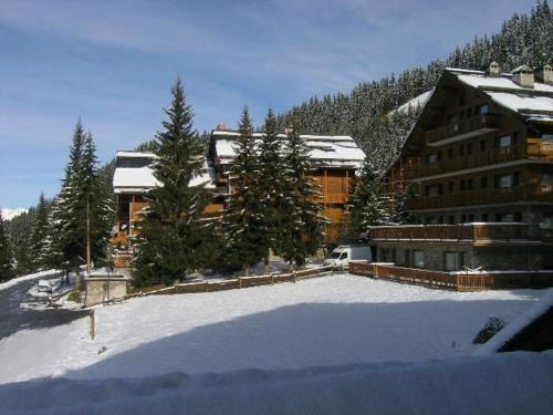 Studio cosy à Meribel, aux pieds des pistes, proche des commerces et restaurants, pour 2 personnes