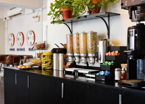 a kitchen with a counter with food on it at Chicago Getaway Hostel in Chicago