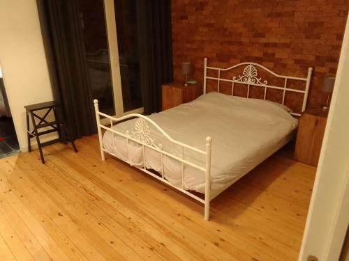 מיטה או מיטות בחדר ב-Superbe appartement