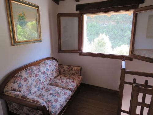 Ein Sitzbereich in der Unterkunft Casa a Verdeggia