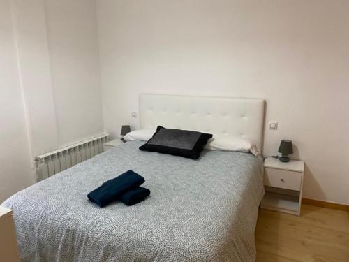 Ένα ή περισσότερα κρεβάτια σε δωμάτιο στο La Raca Jaca