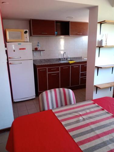 Departamento Céntrico de 1 dormitorio tesisinde mutfak veya mini mutfak