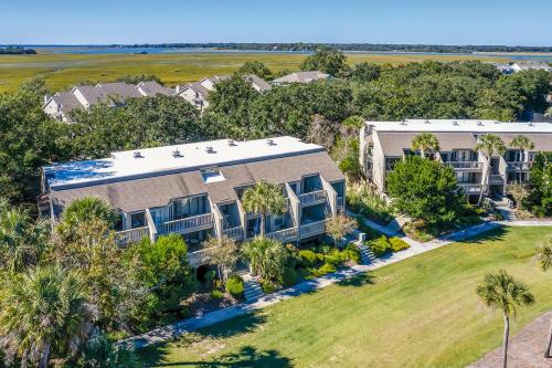 an aerial view of a house with palm trees at Courtside 1640 in Seabrook Island