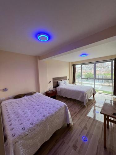 Katil atau katil-katil dalam bilik di HOTEL DORADO AREQUIPA