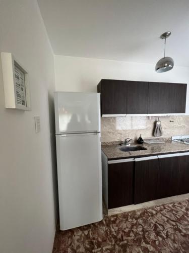 Dapur atau dapur kecil di San Luis Apartment