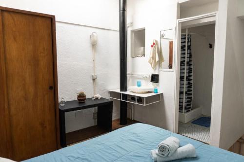 Giường trong phòng chung tại Luminoso 2 Ambientes - Zona Güemes