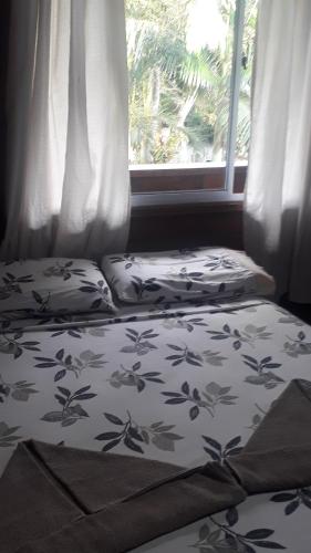 Postel nebo postele na pokoji v ubytování Suíte - Pousada Oka do Mar