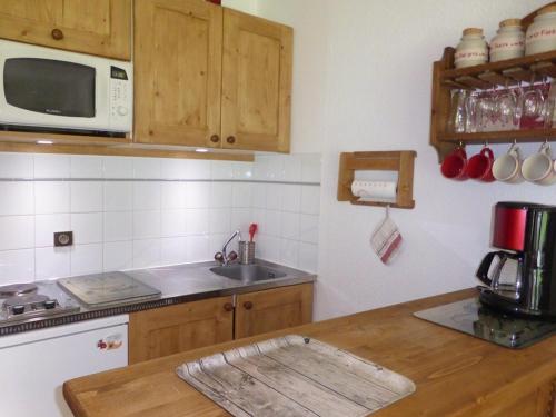 Photo de la galerie de l'établissement Charmant Studio 2/4 pers à 200m des pistes, balcon sud, animaux admis - FR-1-342-148, à Beaufort