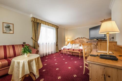 Ένα ή περισσότερα κρεβάτια σε δωμάτιο στο Hotel Christiania