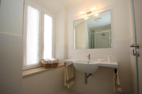 Ванна кімната в Affittacamere le Tre Sorelle