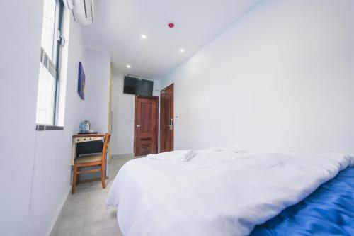 Ένα ή περισσότερα κρεβάτια σε δωμάτιο στο Residence 110 (Hotel and Apartments)