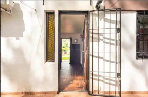 an open door to a house at Dúplex complejo - Centro Villa Gesell - 5 huéspedes in Villa Gesell