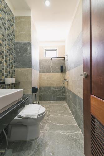 Ένα μπάνιο στο Residence 110 (Hotel and Apartments)