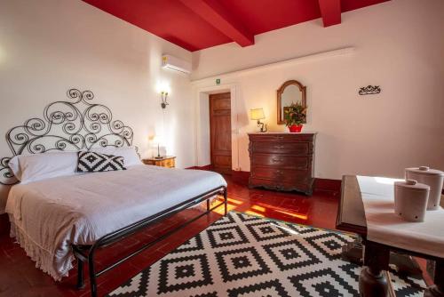 Postel nebo postele na pokoji v ubytování Agriturismo Villa Cavallini