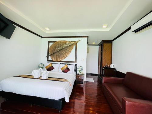 Tempat tidur dalam kamar di Cabana Lipe Beach Resort