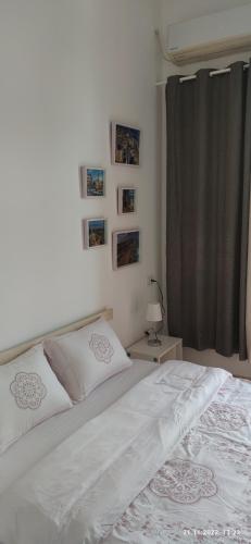 GuestHouse COMFY - separate rooms in the apartment for a relaxing holidayにあるベッド