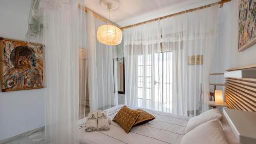 En eller flere senge i et værelse på Villa Ambroise Alhaurín de la Torre by Ruralidays