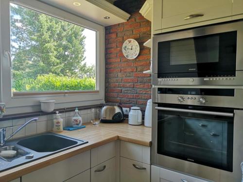 Dapur atau dapur kecil di Sonnenhaus Brodersby