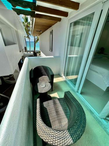 a hammock sitting on the back of a boat at Calypso Beach and Dive Resort in Boracay