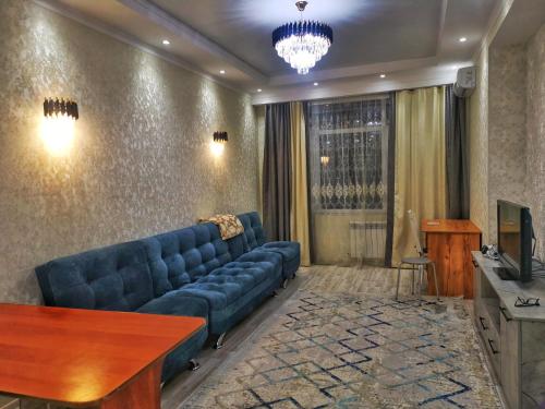 Μια τηλεόραση ή/και κέντρο ψυχαγωγίας στο Central Apartment Bishkek