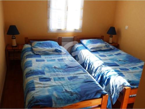 เตียงในห้องที่ Appartement La Tranche-sur-Mer, 3 pièces, 4 personnes - FR-1-357-57