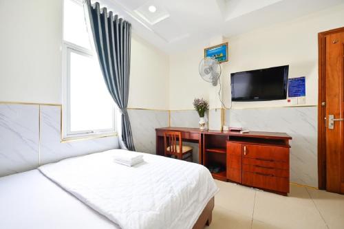 Televisyen dan/atau pusat hiburan di An Binh 2 hotel near Dam Sen Park