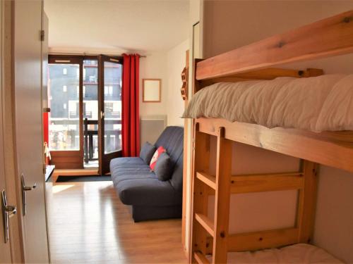 a living room with a bunk bed and a couch at Studio cosy au pied des pistes - 4 couchages - Proche ESF et commerces - FR-1-330-175 in Risoul