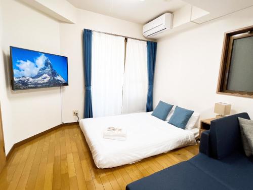Postel nebo postele na pokoji v ubytování PINE TREE HOTEL