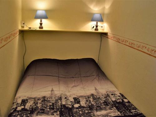 En eller flere senge i et værelse på Studio Cabine 4 Pers, Pied de Piste, Centre Station - FR-1-330-86