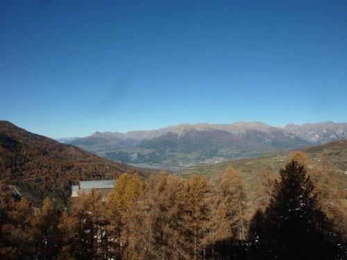 Grand appart skis aux pieds 6 pers, balcon, ascenseur, à coté du jardin des neiges, animaux admis - FR-1-322-220