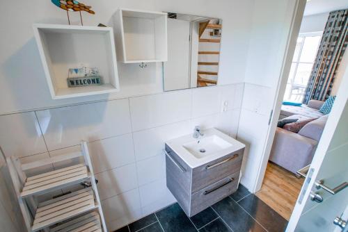 Postel nebo postele na pokoji v ubytování Ferienwohnung 11 "Gut Tossens"