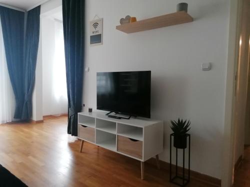 TV a/nebo společenská místnost v ubytování Apartment Belville, Suncokret 26