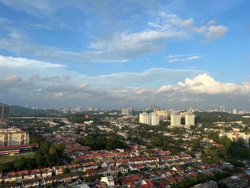 a view of a city with buildings in the background at Cozy Room at Jaya One Petaling Jaya in Petaling Jaya